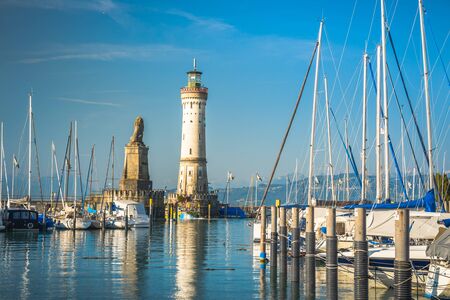 Lindau, Germany, July 2019 - Harbour entrance of Lindau, Lake Constance - Bodensee - with the new lighthouse and the Bavarian Lion. The Lindau lighthouse is the southernmost lighthouse in Germanyのeditorial素材