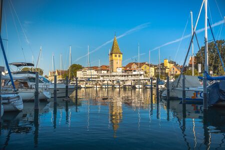 Lindau, Germany, July 2019 - View of marina and the Mangturm tower situated in the german port Lindau.のeditorial素材
