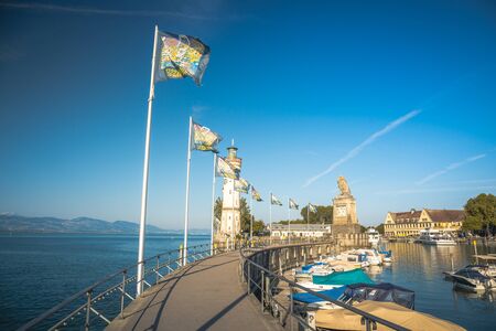Lindau, Germany, July 2019 - Harbour entrance of Lindau, Lake Constance - Bodensee - with the new lighthouse and the Bavarian Lion. The Lindau lighthouse is the southernmost lighthouse in Germanyのeditorial素材