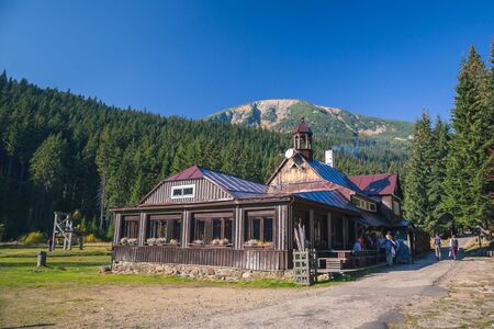 KRKONOSE, CZECH REPUBLIC, OCTOBER 2018 - Krkonose mountains national park. Bouda v Obrim Dole Restaurant and hotel. Path to Snezka in sunny autumn weather.のeditorial素材