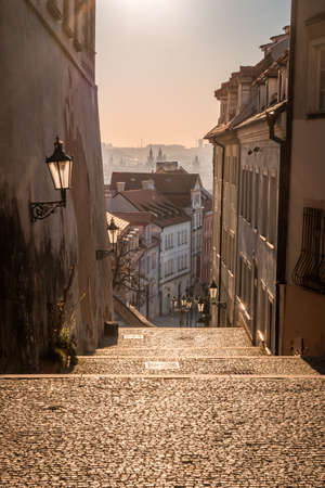 PRAGUE, CZECH REPUBLIC, APRIL 2020 - Panorama of Prague from the stairs of the Old Castle leading to...
