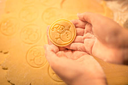 Stamped Christmas Sugar Cookie Dough, Made With Love, Snowman theme. Sinhle war cookie in womans...