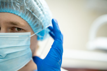 Dentist in medical uniform in clinicの写真素材
