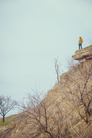 lonly man on a cliffの写真素材