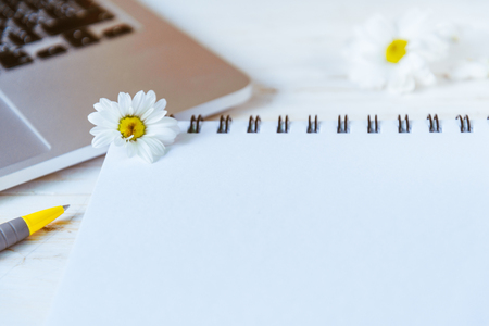work office desk with computer laptop, notebook, penの写真素材