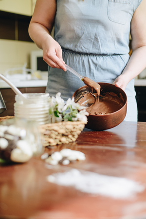 woman at home baking cake