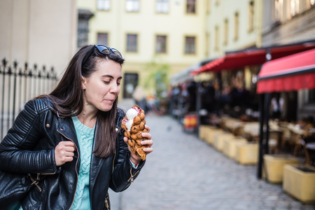 woman eat icecream oustideの写真素材