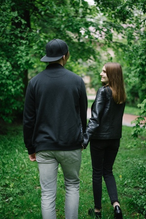 young loving couple walk in that parkの写真素材