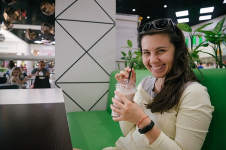Woman drinking smoothie