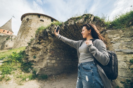 yang pretty woman tourist in front of castleの写真素材