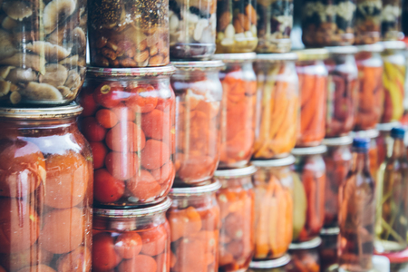 Jars with pickled vegetables. Preserved foodの写真素材