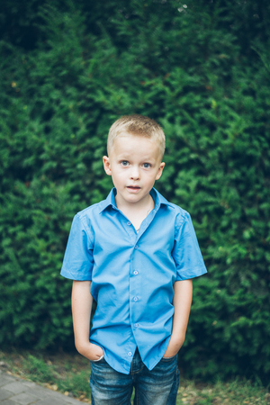 little Boy portrait in the parkの写真素材
