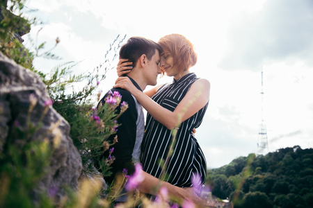 couple have a date on the peak of the hillの写真素材