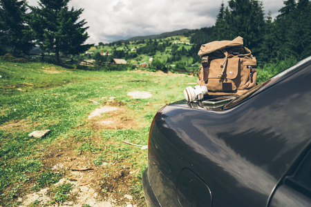 car with backpack on the trunkの写真素材