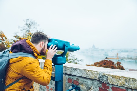man at observation deck enjoy view of the cityの写真素材