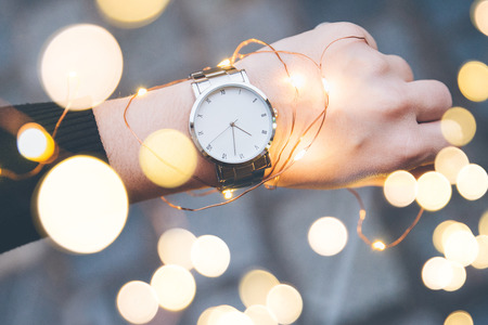 woman hands with watch on the wrist first person view
