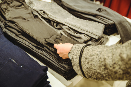 woman seek new jeans in the mallの写真素材