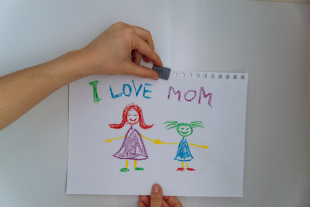 children's drawing on fridge. I love mom.の写真素材