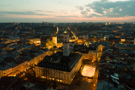 Panoramic view on sunset above old european city. birds eye view.の写真素材