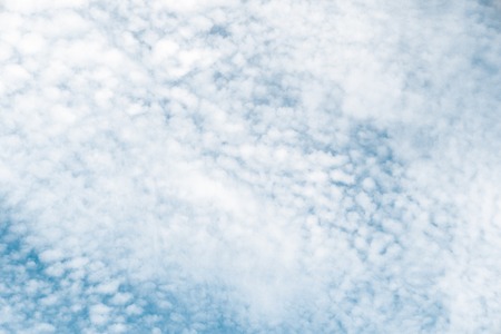 white clouds on blue sky. background texture. graphic resourcesの写真素材