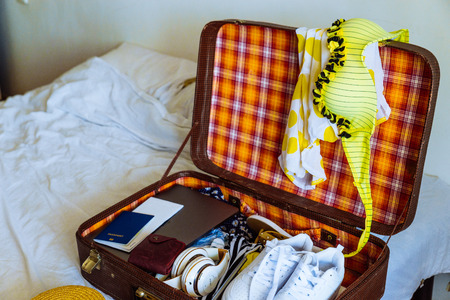 suitcase with clothes ready for trip. travel concept. copy spaceの写真素材