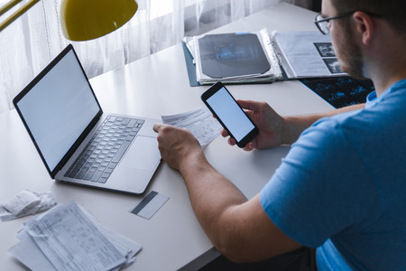 man checking medicine bills. insurance healthcare. copy space