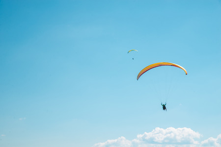 mountains leisure activities. paragliding. summer time. landscapeの写真素材