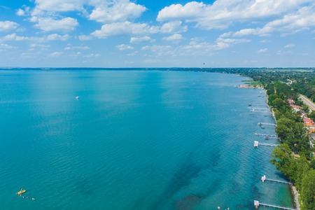 aerial view of lake with swimming people. summer time. travel concept