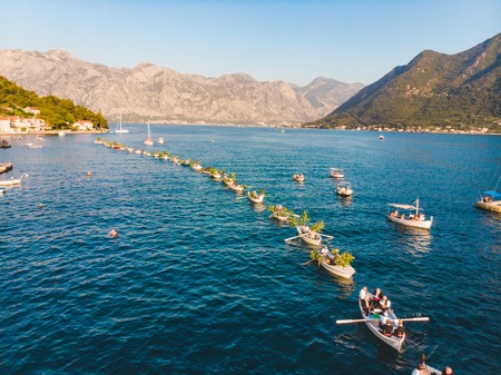 aerial view of fashinada holidays in perast montenegro. boats in one line