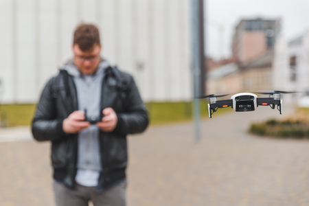 drone close up blurred man on background. copy space