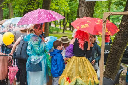 LVIV, UKRAINE - July 17,2018: families with kids walking by park. professional kids day holidaysのeditorial素材