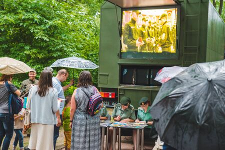 LVIV, UKRAINE - July 17,2018: families with kids walking by park. professional kids day holidays