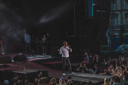 LVIV, UKRAINE - June 18, 2019: Vakarchuk at stage talking in microphone. politicalのeditorial素材