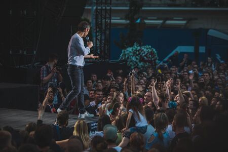 LVIV, UKRAINE - June 18, 2019: Vakarchuk at stage talking in microphone. politicalのeditorial素材