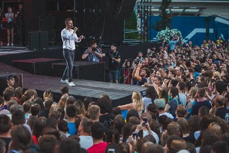 LVIV, UKRAINE - June 18, 2019: Vakarchuk at stage talking in microphone. politicalのeditorial素材