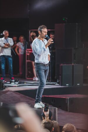 LVIV, UKRAINE - June 18, 2019: Vakarchuk at stage talking in microphone. politicalのeditorial素材