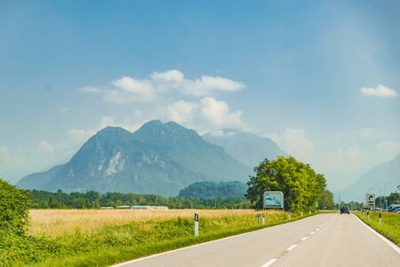 view of the speed road mountains on background hot summer dayの写真素材