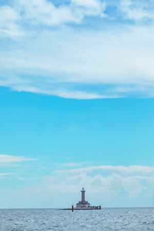 lighthouse it island in sea horizon view seascape copy spaceの写真素材