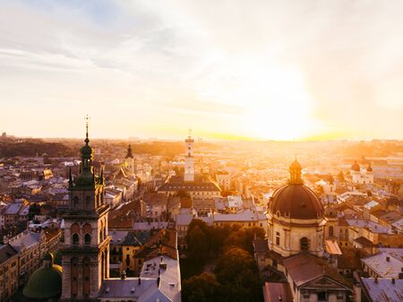 aerial view of sunset above european city in autumn