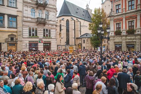 LVIV, UKRAINE - October 7, 2018: religious procession at city streets. nuns and monksのeditorial素材