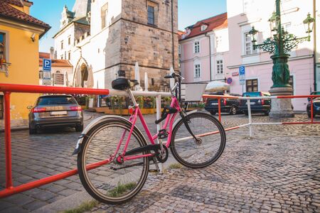 city bike parked at roadside in european city. ecology transport.の写真素材