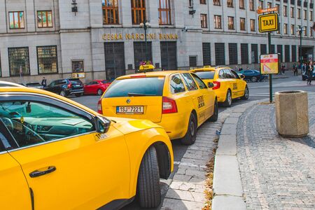 PRAGUE, CZECH - September 22, 2018: yellow taxi parked at prague street. close upのeditorial素材