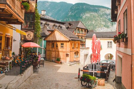 Hallstatt, Austria - June 15, 2019: view of tourist city street overloaded with people. travel...