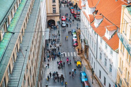 PRAGUE, CZECH - September 22, 2018: aerial view of prague. people walking by streetのeditorial素材