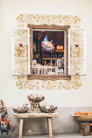 Hallstatt, Austria - June 15, 2019: view of store window with different souvenirsのeditorial素材