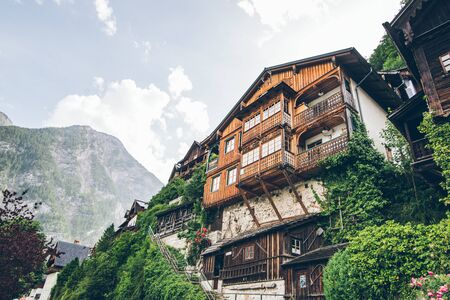 building at the cliff edge summer time hallstatt austria