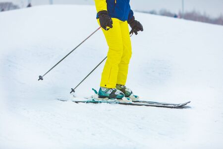 KAZKOVA POLYANA, UKRAINE - January 26, 2019: man skiing down by hill. winter timeのeditorial素材