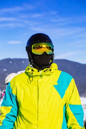 portrait of man in snowboard mask helmet and balaclava.の写真素材