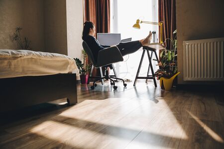 woman working at home. telework on laptop. copy spaceの写真素材