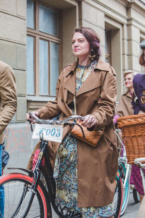 Lviv, Ukraine - May 4, 2019: city birthday festival people ride old retro bicycles. copy space
